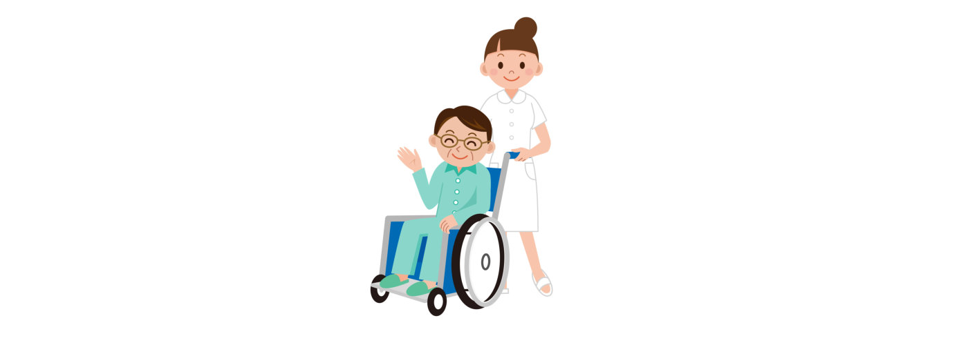Patient in a wheelchair next to a nurse in hospital ward
